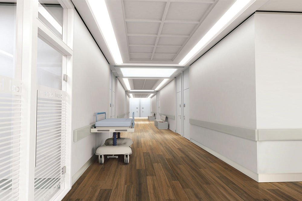 Hospital corridor with continuous wood-look sheet vinyl