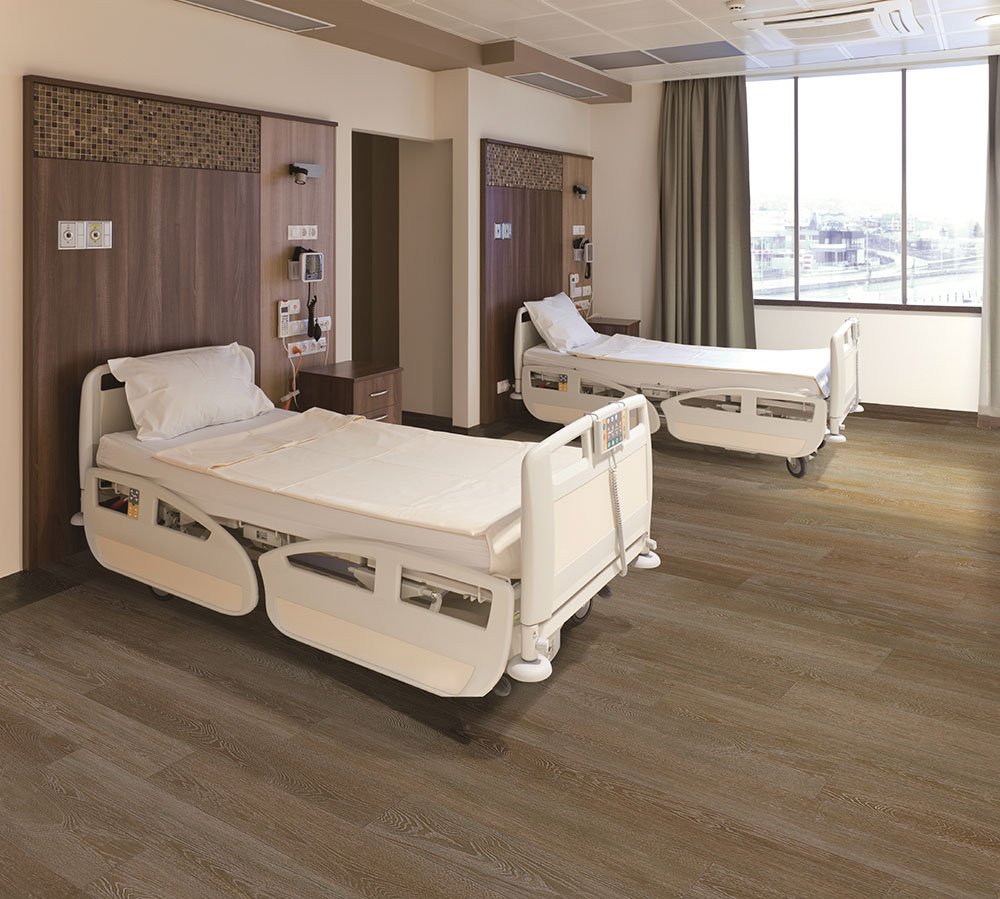 Hospital patient room with wood-look sheet vinyl