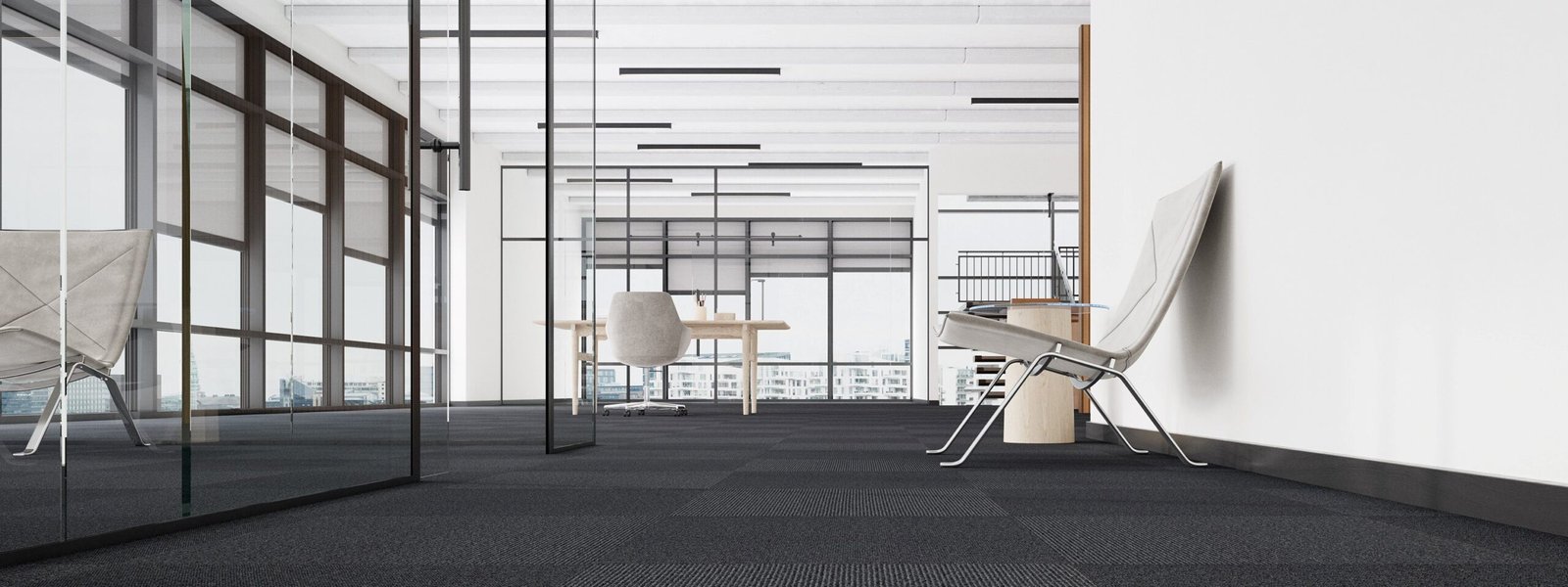 Open-plan office on commercial carpet tile with glass partitions