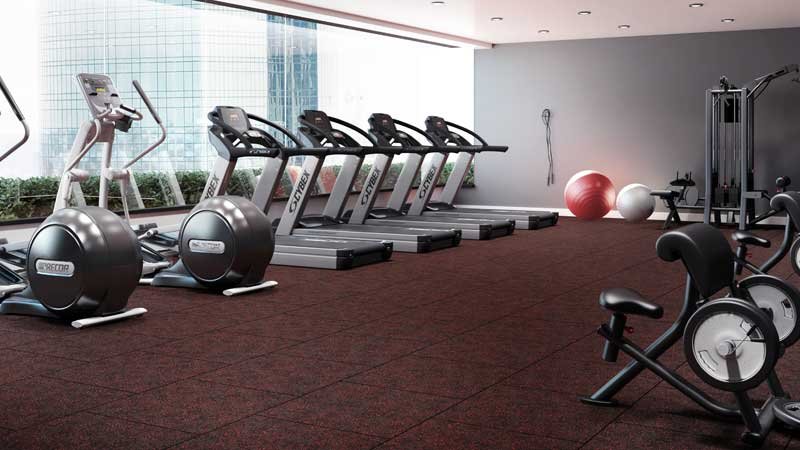 Hotel cardio room with treadmills on rubber sports flooring