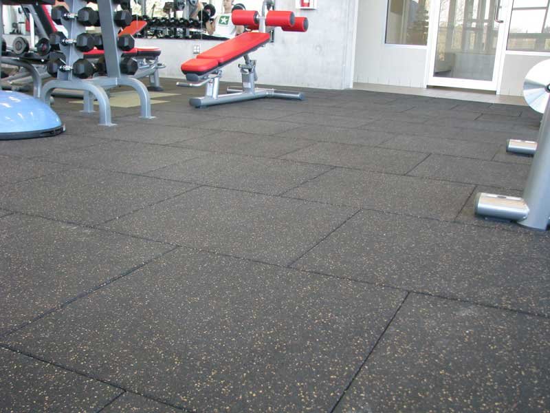 Free-weight area on recycled rubber tile